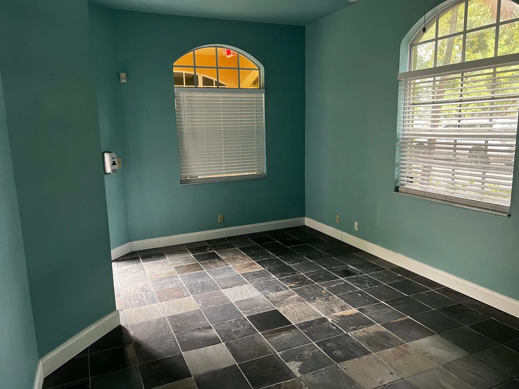 Actual Magnolia 720 interior with an arched window and natural light